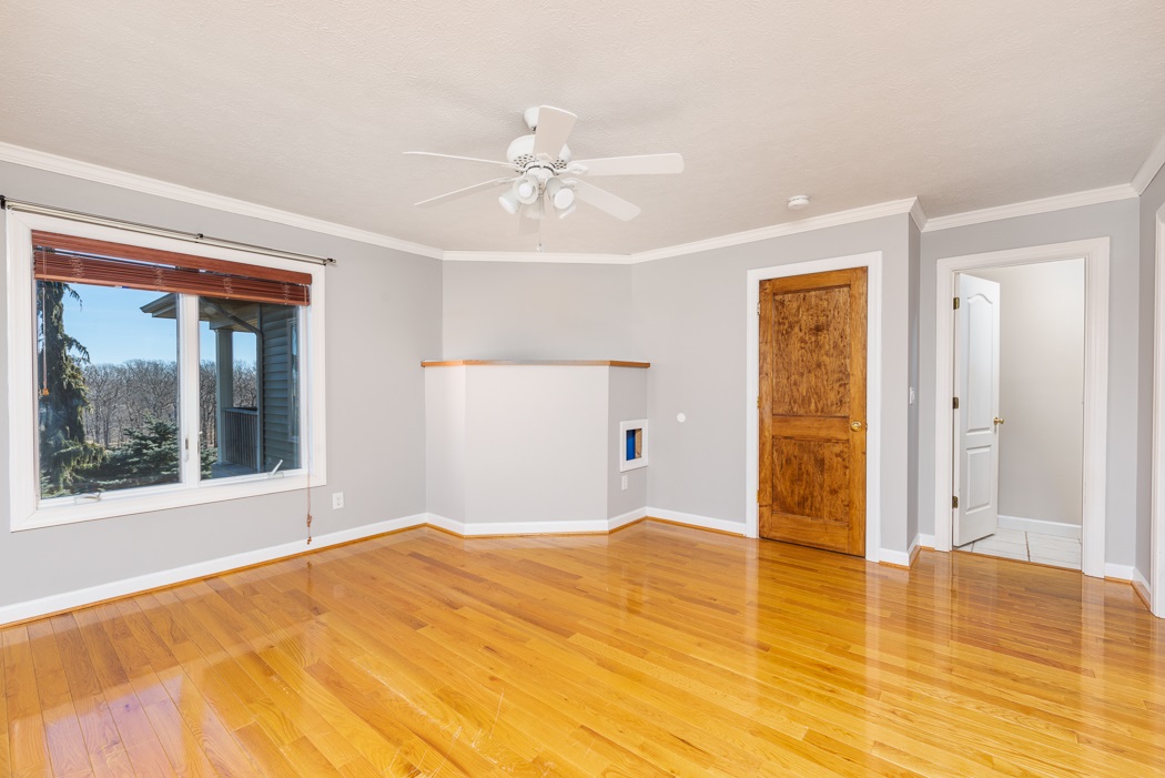 2161 Middlebrook Road Staunton, VA 24401 - Photo 22 of 75 a view of empty room with wooden floor and fan
