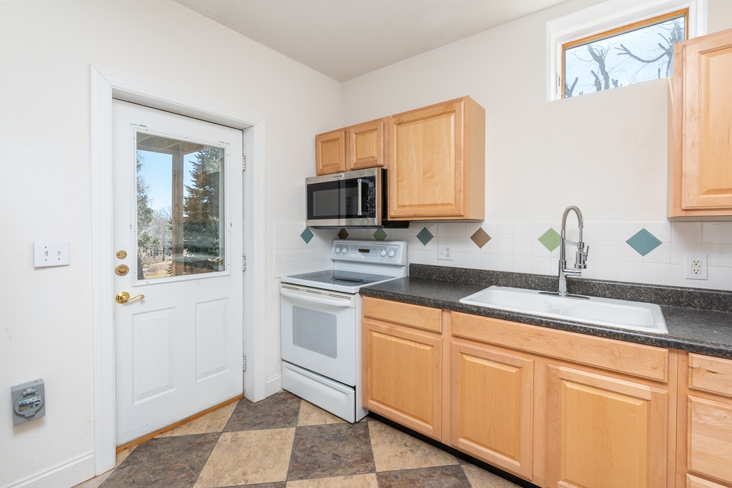 2161 Middlebrook Road Staunton, VA 24401 - Photo 29 of 75 a kitchen with stainless steel appliances granite countertop a sink and a microwave