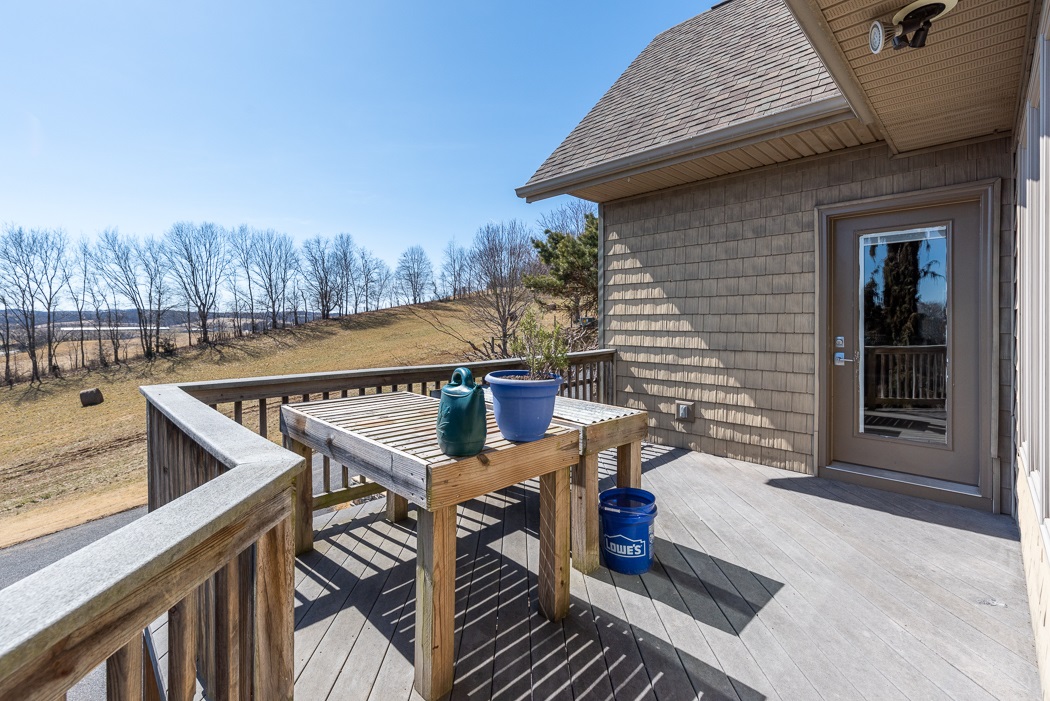 2161 Middlebrook Road Staunton, VA 24401 - Photo 42 of 75 a view of a roof deck with chair and wooden floor