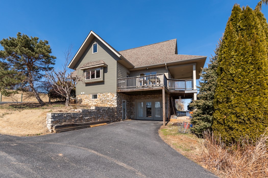 2161 Middlebrook Road Staunton, VA 24401 - Photo 57 of 75 a front view of a house with a yard and garage