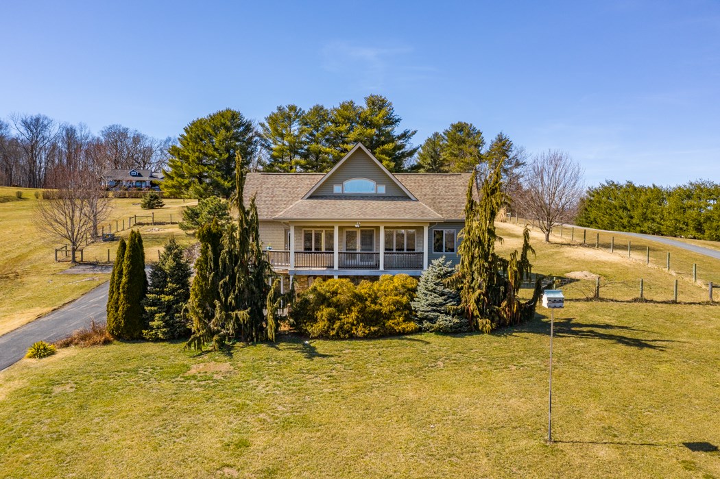 2161 Middlebrook Road Staunton, VA 24401 - Photo 8 of 75 a front view of a house with a big yard