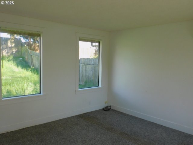 511 Panda Loop Eugene, OR 97401 - Photo 2 of 13 an empty room with window