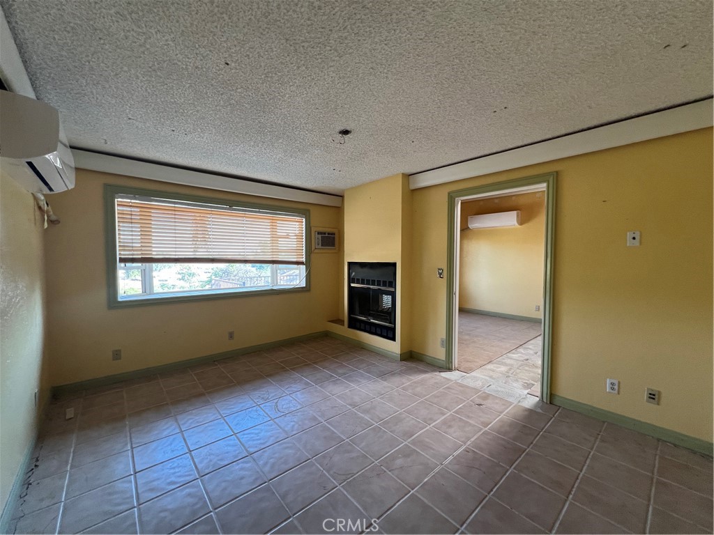 30643 Scott Road Menifee, CA 92584 - Photo 9 of 13 a view of an empty room with a window
