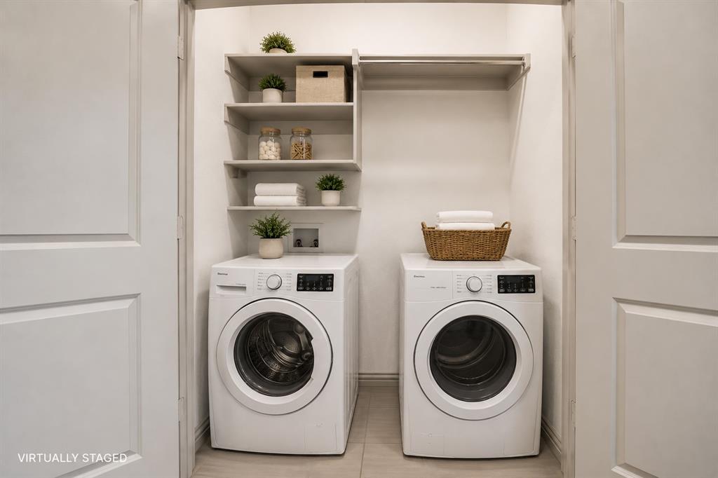 421 Matchbox Street Argyle, TX 76226 - Photo 33 of 40 Dedicated laundry area featuring a washer, dryer, built-in shelving, and a clothing rod