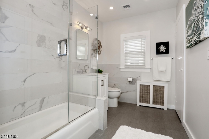 2 Maysenger Road Mahwah, NJ 07430 - Photo 12 of 28 a bathroom with a bathtub sink and toilet