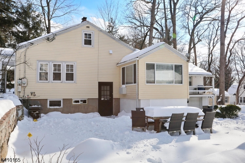 2 Maysenger Road Mahwah, NJ 07430 - Photo 26 of 28 a view of a house with a yard covered in snow