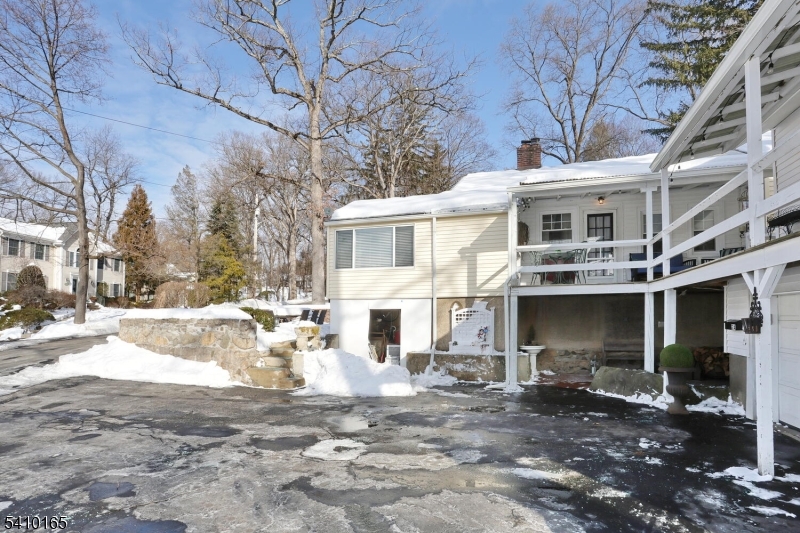 2 Maysenger Road Mahwah, NJ 07430 - Photo 27 of 28 a view of a house with a yard covered in snow