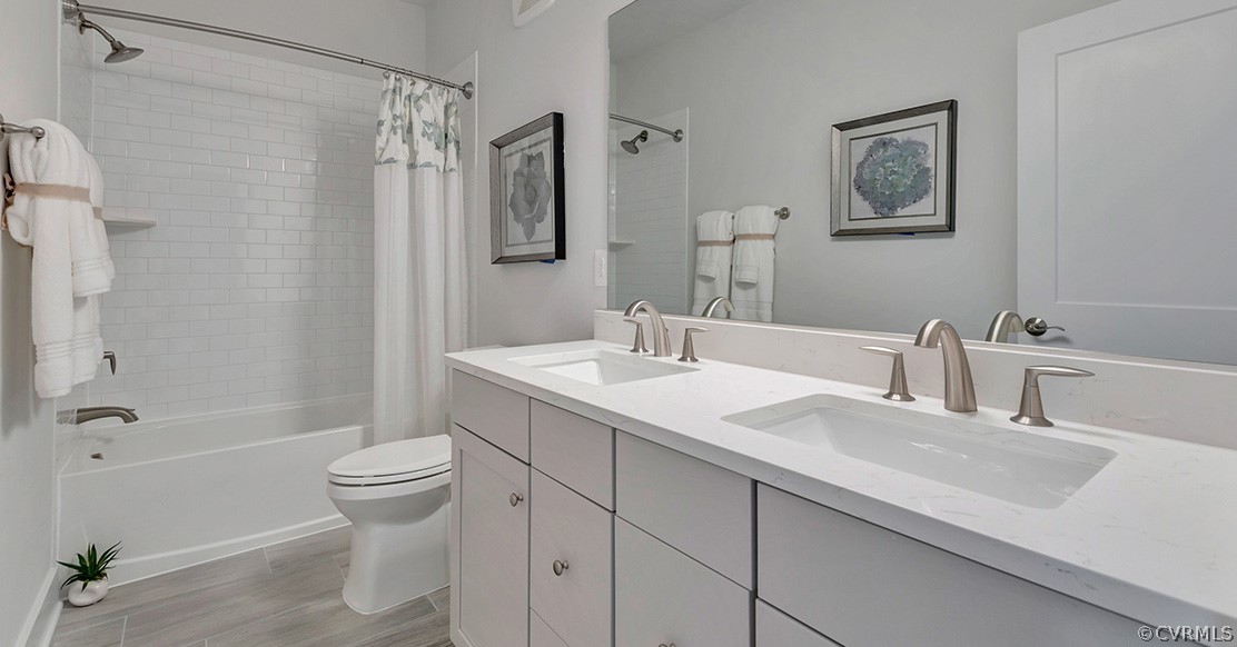200 Brattice Drive Midlothian, VA 23114 - Photo 22 of 35 a bathroom with a sink toilet and shower