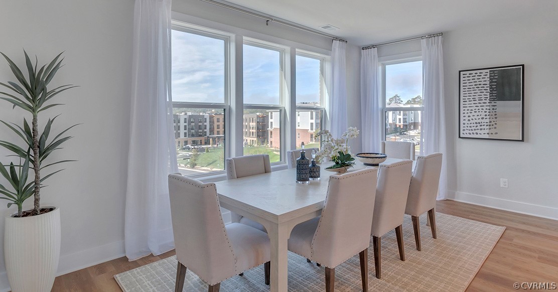200 Brattice Drive Midlothian, VA 23114 - Photo 7 of 35 a view of a dining room with furniture window and wooden floor