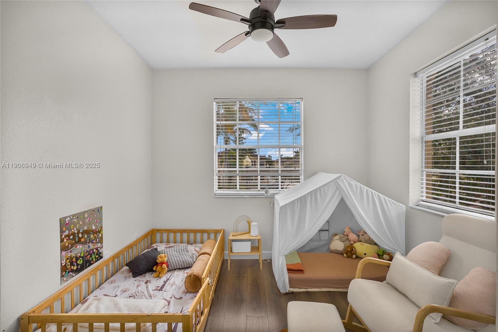 9239 Southwest 227th Street, Unit 1 Cutler Bay, FL 33190 - Photo 21 of 37 a living room with furniture and a window