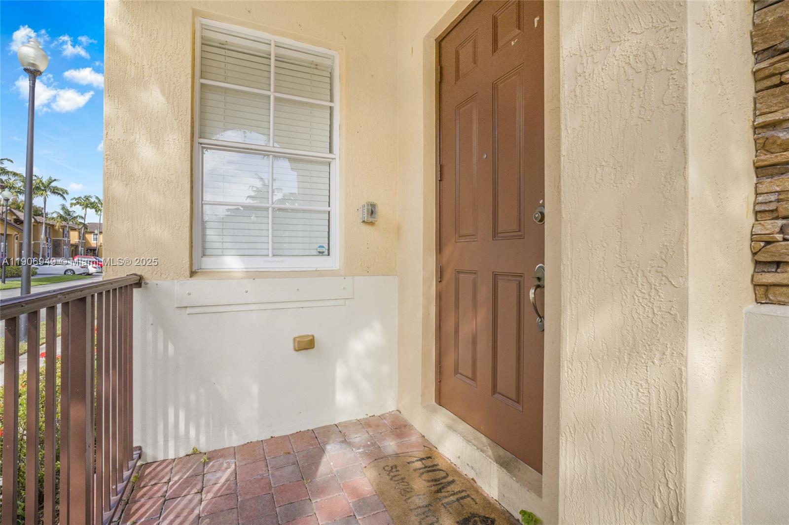 9239 Southwest 227th Street, Unit 1 Cutler Bay, FL 33190 - Photo 3 of 37 a view of front door
