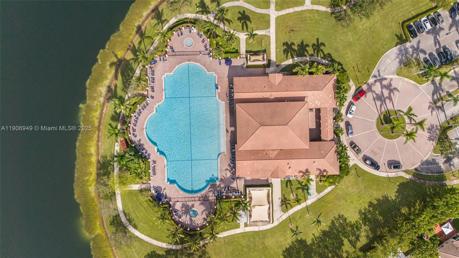 9239 Southwest 227th Street, Unit 1 Cutler Bay, FL 33190 - Photo 32 of 37 an aerial view of a swimming pool