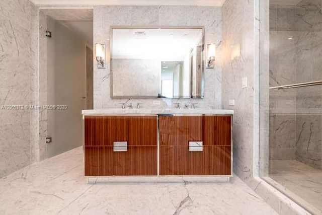 a view of a lake from a balcony