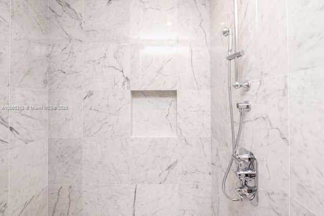 a view of a city with tall buildings