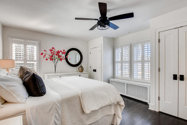 161 Washington Circle Lake Forest, IL 60045 - Photo 14 of 25 a bedroom with a bed and a chandelier