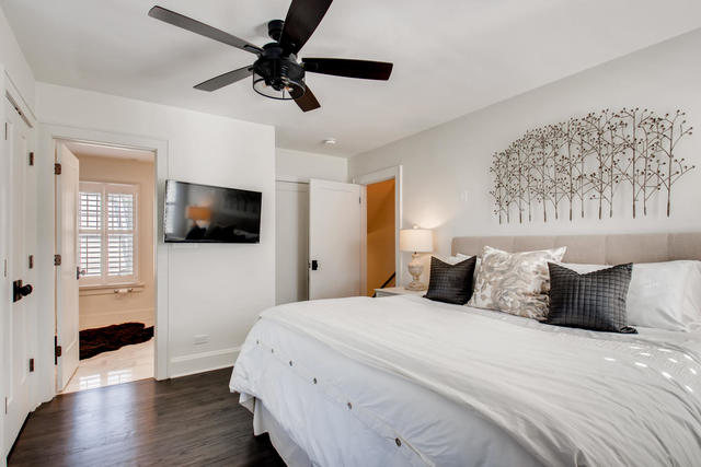 161 Washington Circle Lake Forest, IL 60045 - Photo 15 of 25 a bedroom with a bed and a flat screen tv