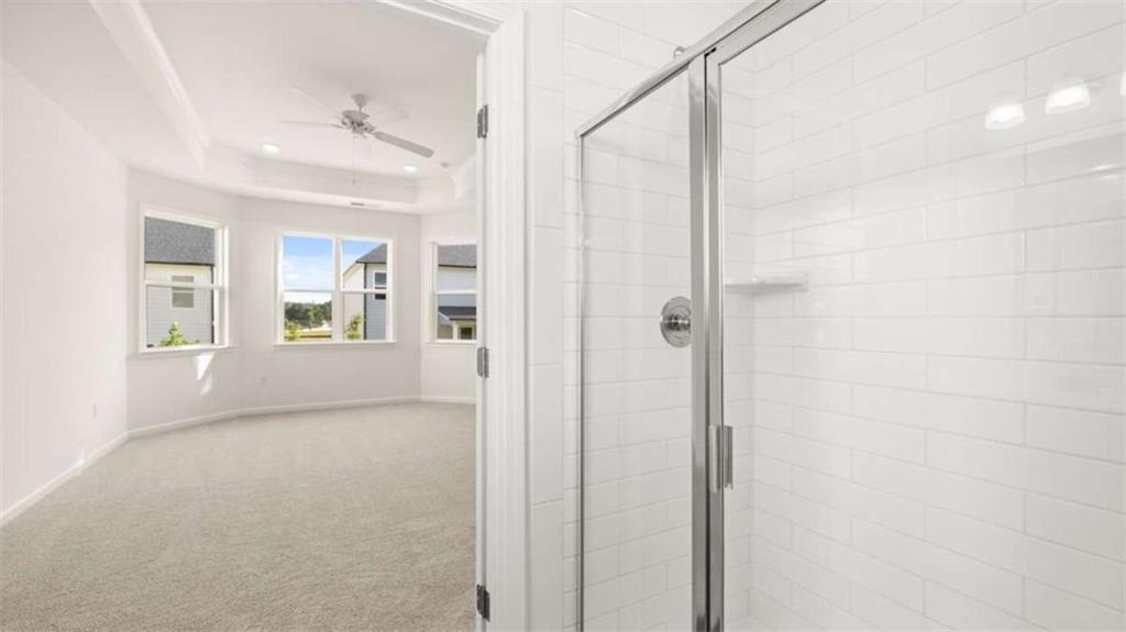 13599 Whitman Lane Covington, GA 30014 - Photo 27 of 51 a view of a bathroom with a shower and a sink