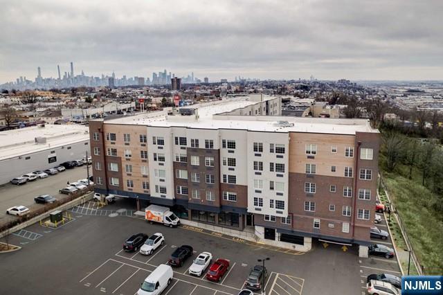520 Cliff Street, Unit 215 Fairview, NJ 07022 - Photo 22 of 22 an aerial view of a building with streets and trees