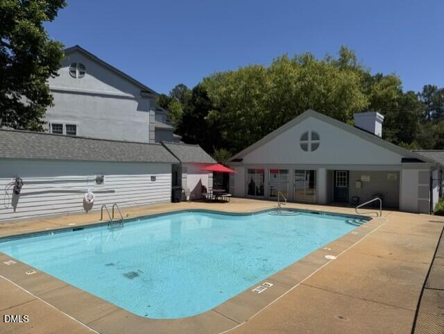 2506 Avent Ferry Road, Unit 101 Raleigh, NC 27606 - Photo 9 of 19 a front view of a house with a yard