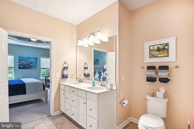 a view of a livingroom with furniture and a workspace