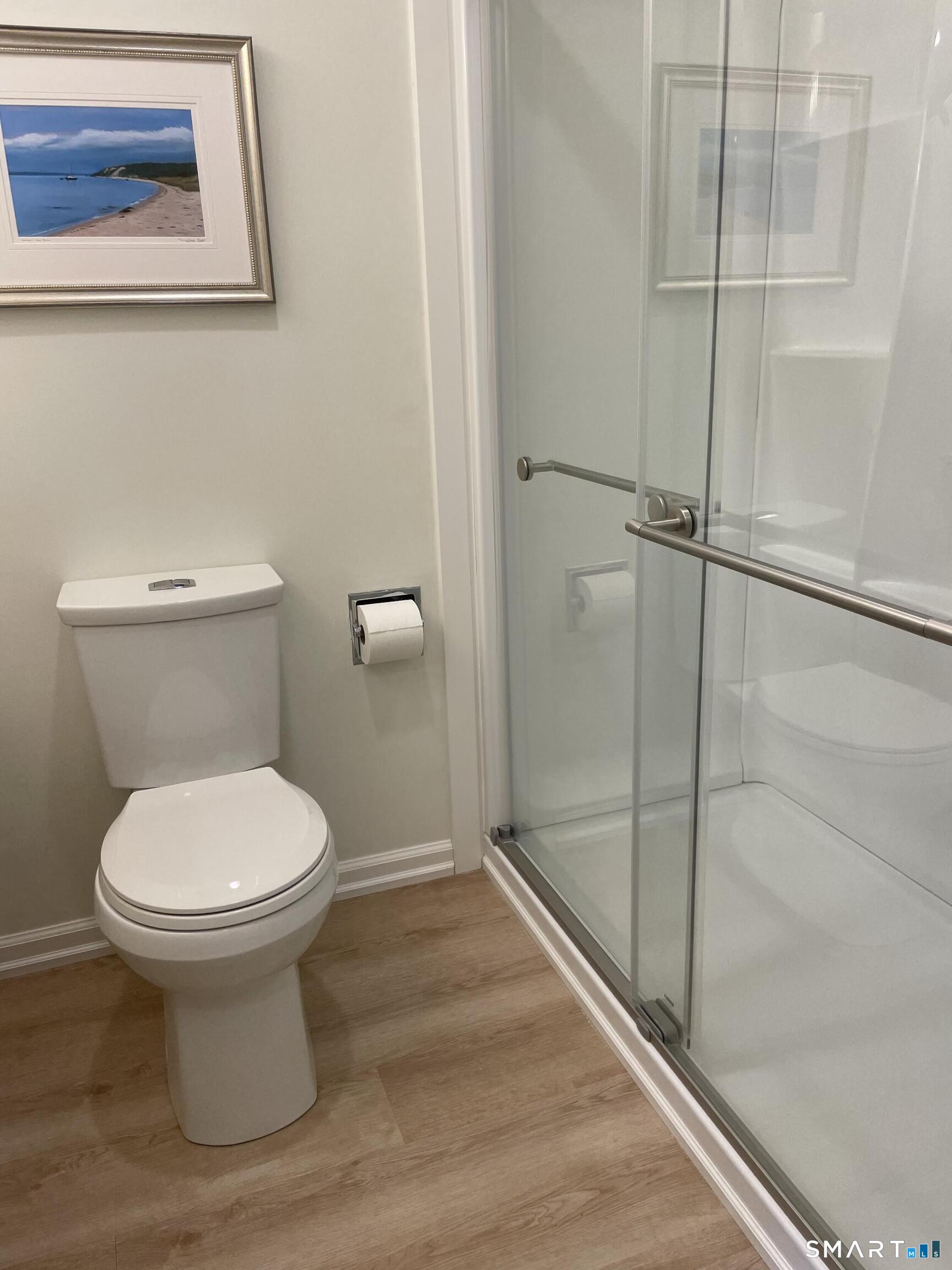 449 The Meadows Enfield, CT 06082 - Photo 4 of 11 a bathroom with a toilet and a shower