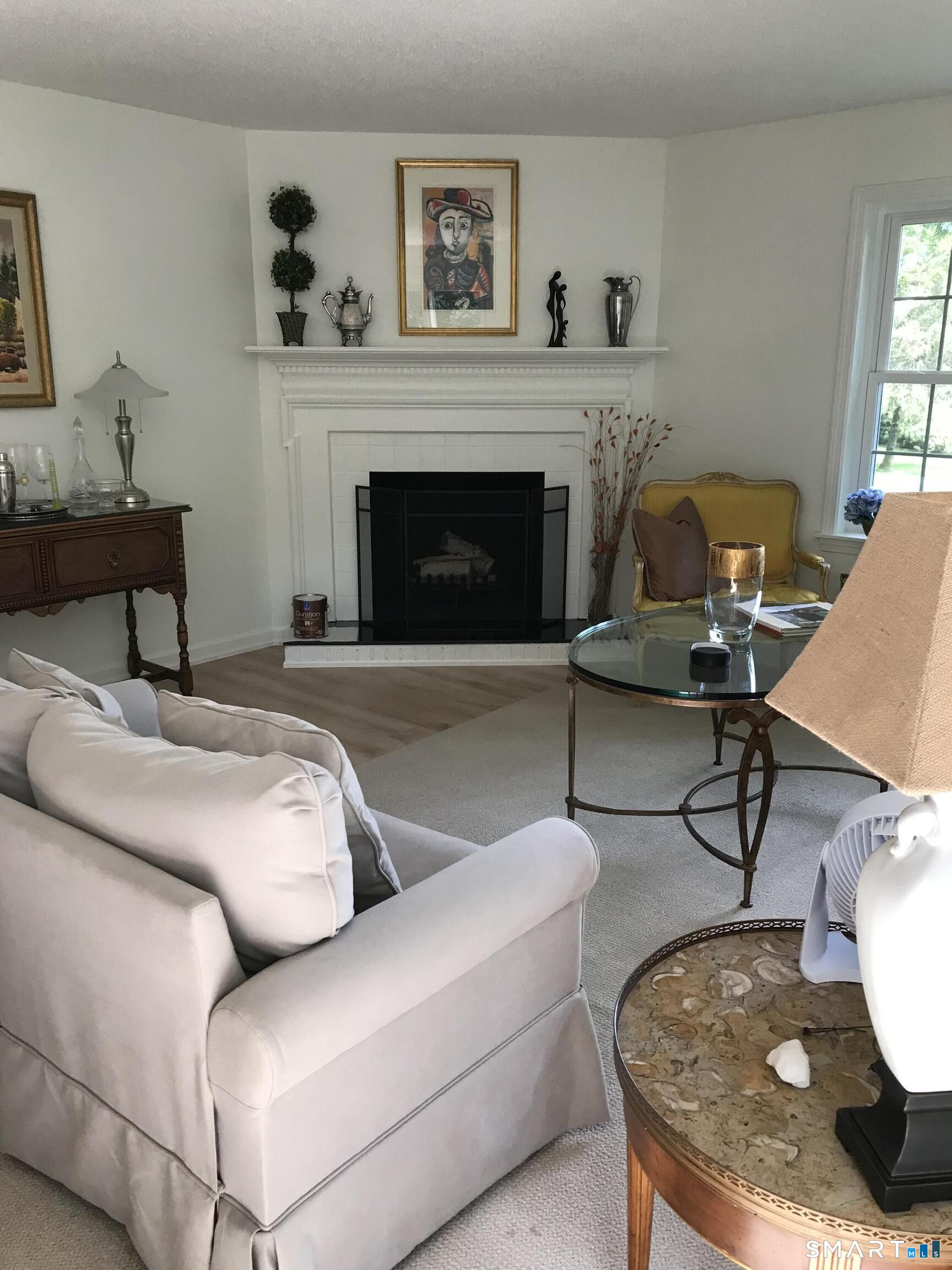 449 The Meadows Enfield, CT 06082 - Photo 5 of 11 a living room with furniture and a fireplace
