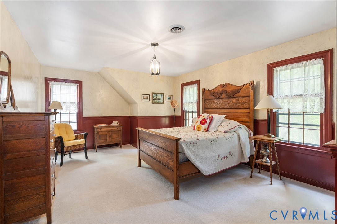 7381 McClellan Road Mechanicsville, VA 23111 - Photo 34 of 66 a bed room with a bed and a chair
