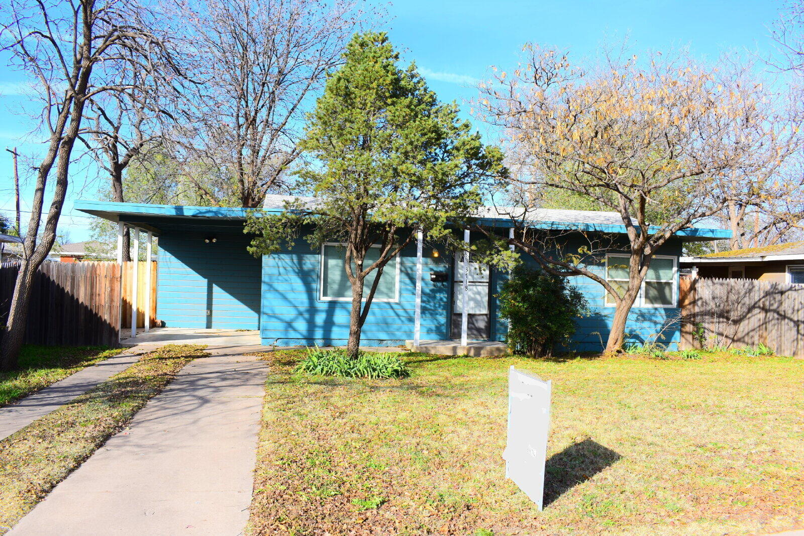 a view of a house with snow on the wall
