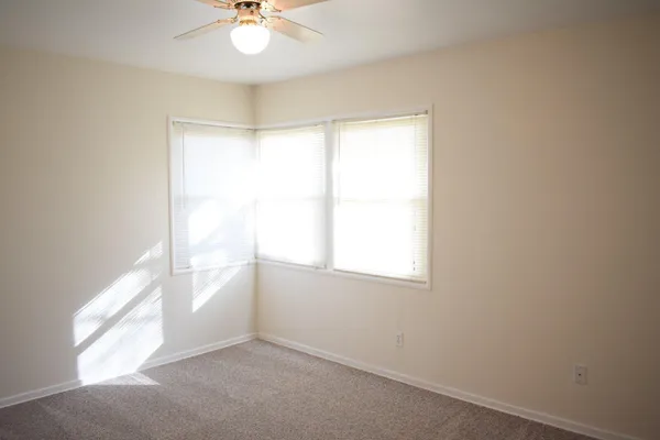 an empty room with a window