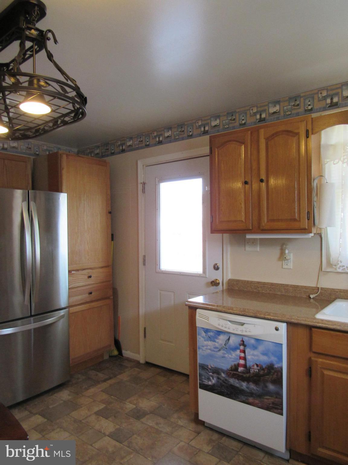 105 Mitchell Street Elkton, MD 21921 - Photo 12 of 30 KITCHEN HAS A REAR DOOR TO THE DECK