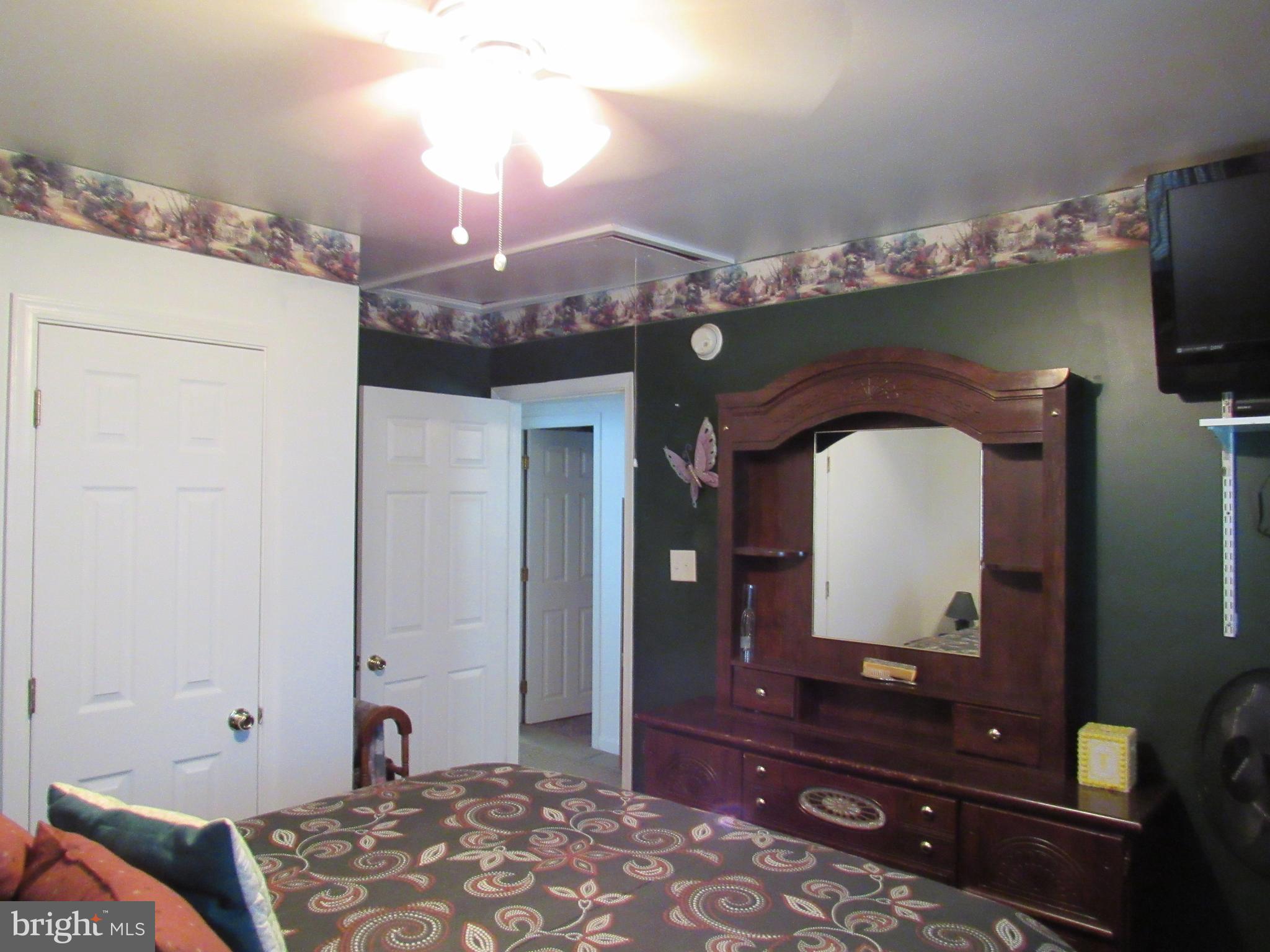 105 Mitchell Street Elkton, MD 21921 - Photo 19 of 30 MASTER BEDROOM WITH ATTIC PULL DOWN STEPS
