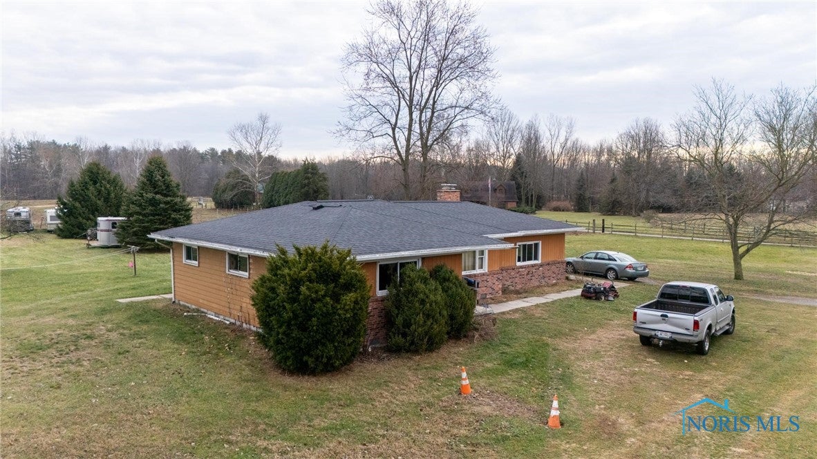 5625 Waterville Swanton Road Swanton, OH 43558 - Photo 11 of 45 House roof estimated 10 years old.