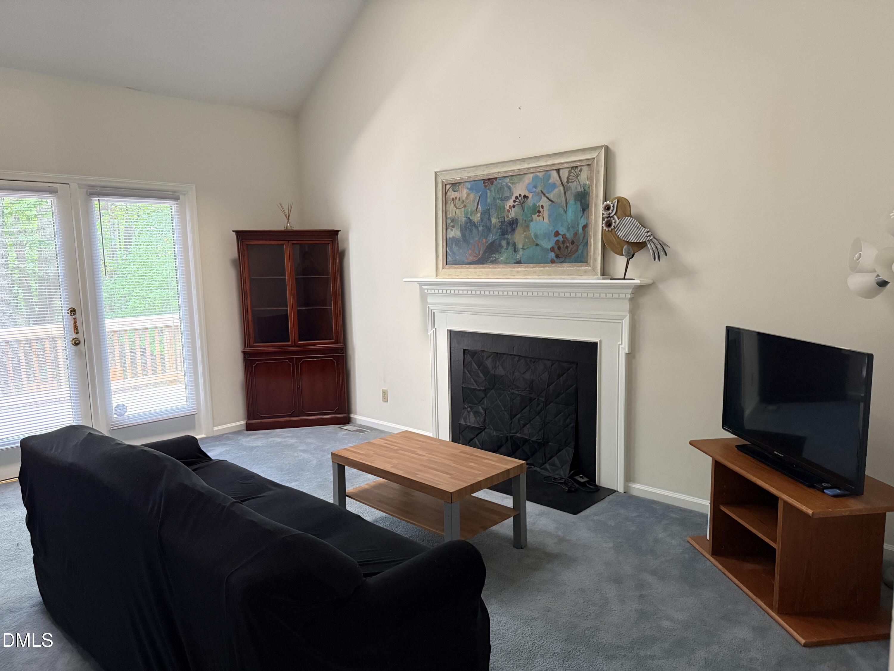 400 Oak Run Drive Raleigh, NC 27606 - Photo 17 of 27 Family room with access to back deck