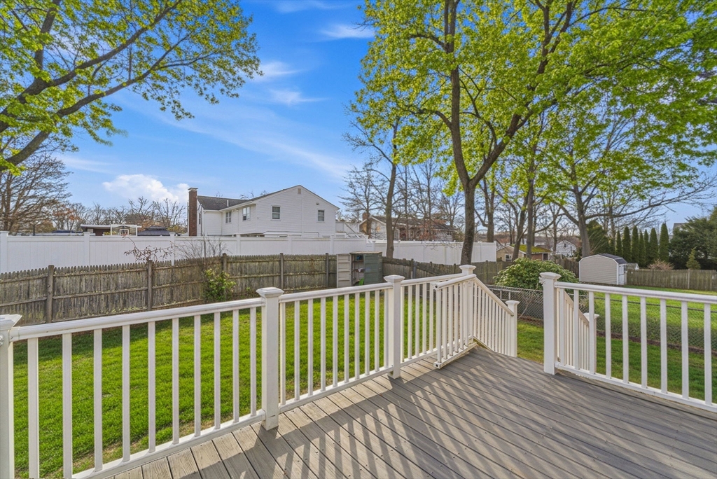 7 Carol Street Stoneham, MA 02180 - Photo 27 of 28 a view of a house with a small yard