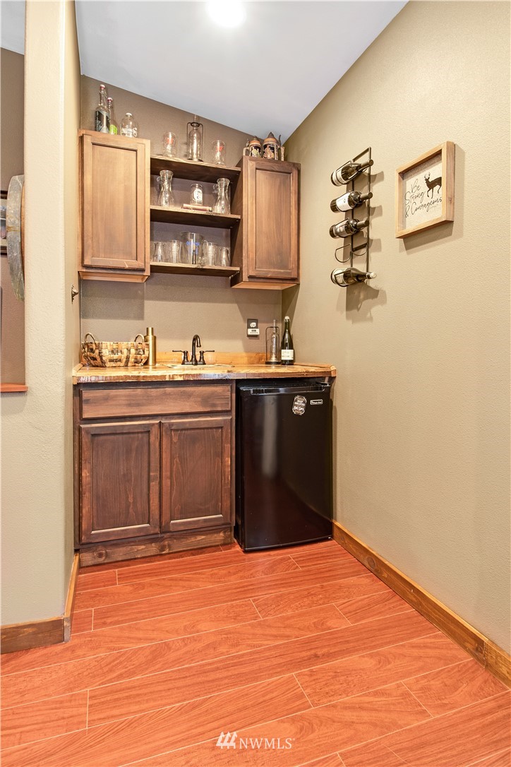 16704 Sargent Road Southwest Rochester, WA 98579 - Photo 19 of 40 a bathroom with a sink and a mirror