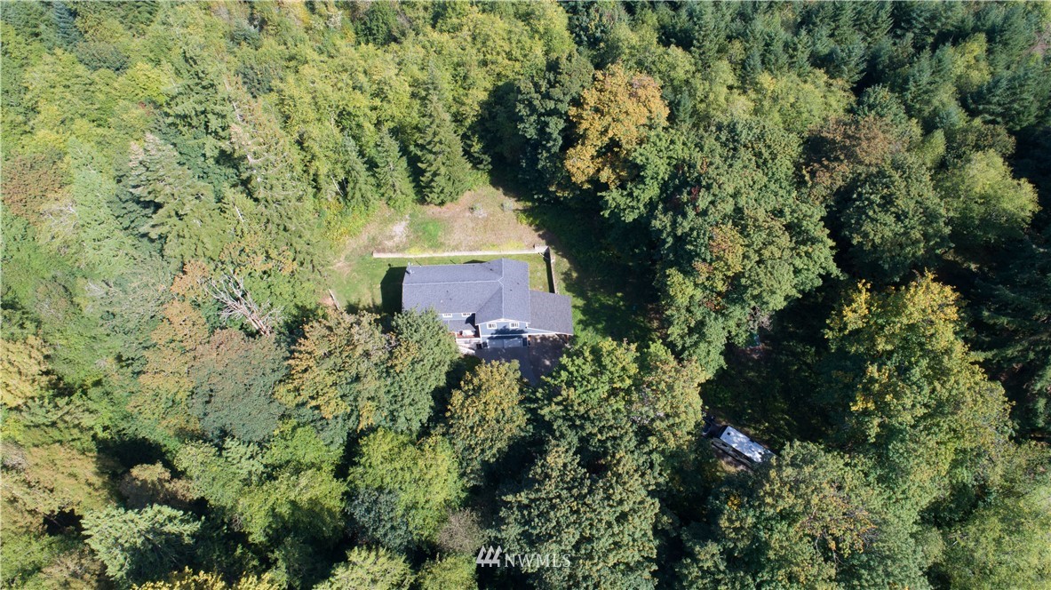 16704 Sargent Road Southwest Rochester, WA 98579 - Photo 36 of 40 a view of a house with a yard