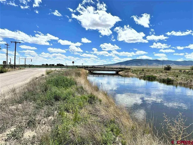 a view of a lake in middle of the town