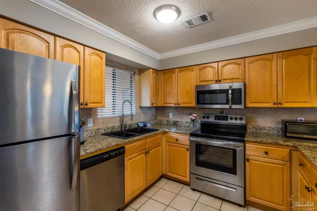 $375,000 | 7453 Sunset Harbor Drive, Unit 107, Navarre Beach, FL 32566