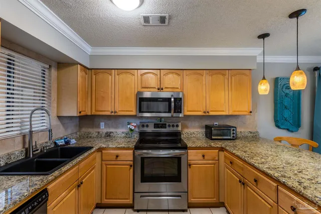 $375,000 | 7453 Sunset Harbor Drive, Unit 107, Navarre Beach, FL 32566