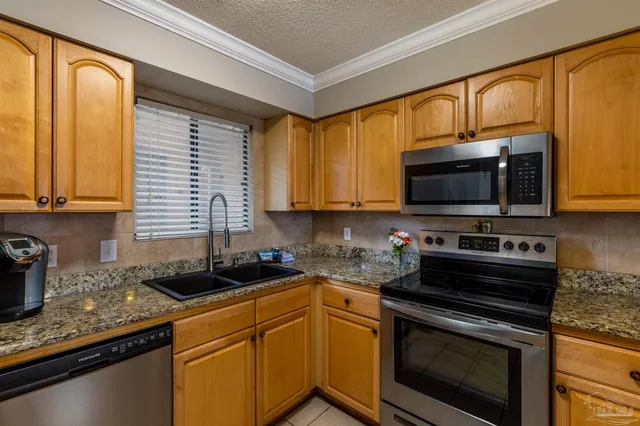 $375,000 | 7453 Sunset Harbor Drive, Unit 107, Navarre Beach, FL 32566