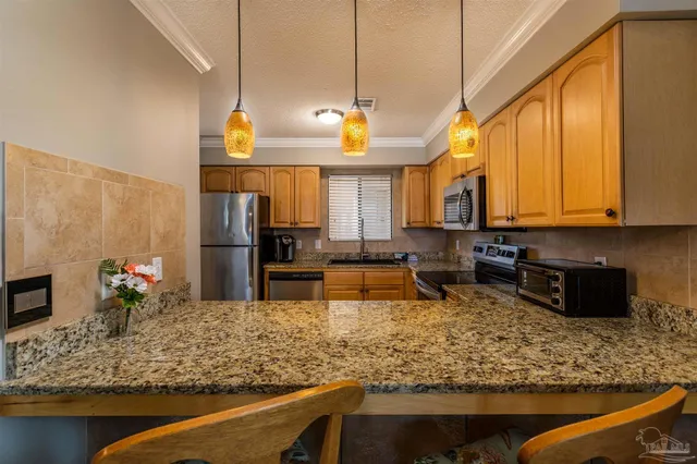 $375,000 | 7453 Sunset Harbor Drive, Unit 107, Navarre Beach, FL 32566