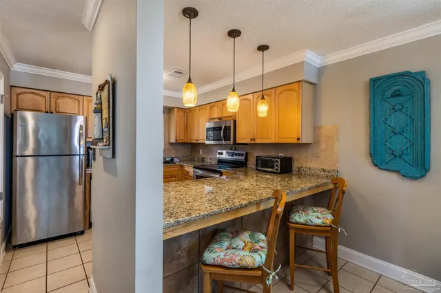 $375,000 | 7453 Sunset Harbor Drive, Unit 107, Navarre Beach, FL 32566