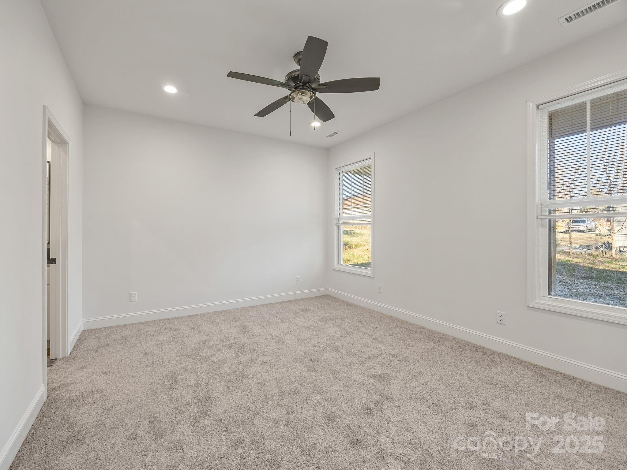 409 South Lyles Avenue Landrum, SC 29356 - Photo 17 of 36 a view of an empty room with a window
