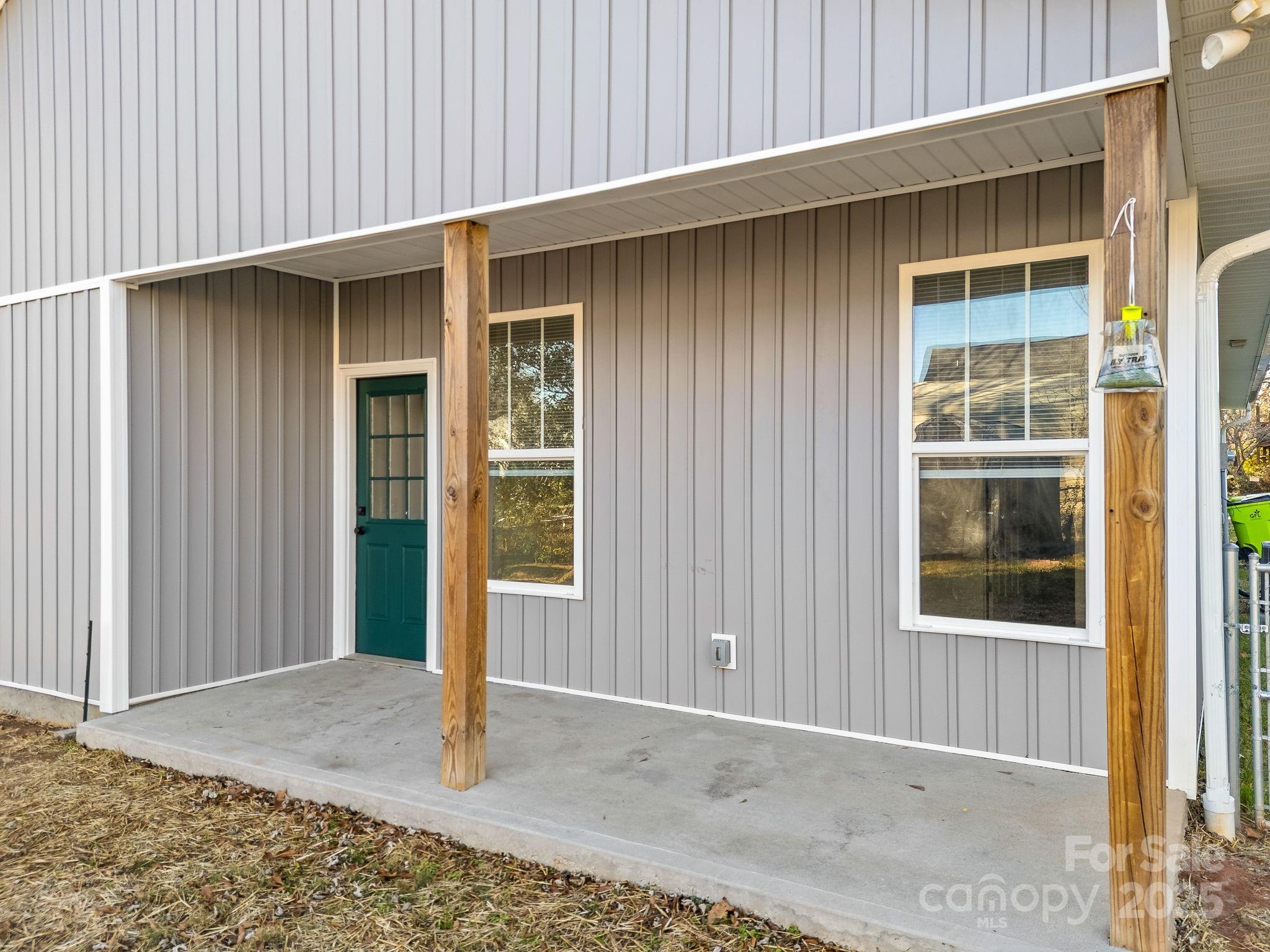 409 South Lyles Avenue Landrum, SC 29356 - Photo 34 of 36 a view of a house with a outdoor space