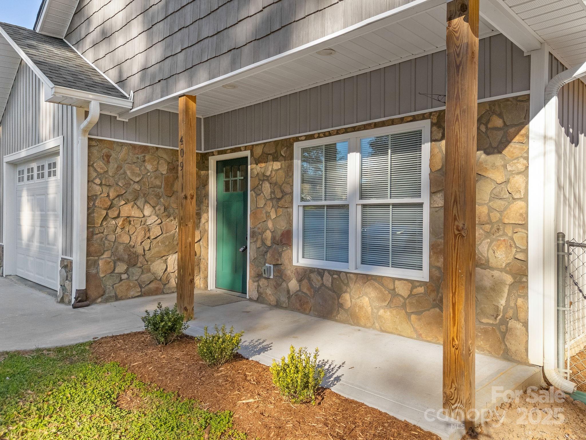 409 South Lyles Avenue Landrum, SC 29356 - Photo 5 of 36 a front view of a house