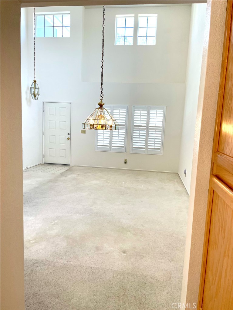 43222 Darby Street Lancaster, CA 93535 - Photo 6 of 9 an empty room with windows