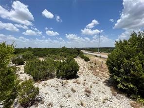Tbd East Windemere Street Leander, TX 78641 - Photo 7 of 9 a view of a lake with a yard