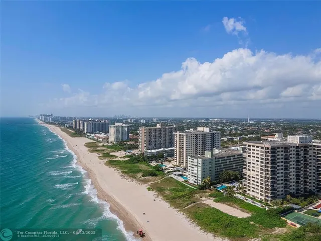 a view of a city with tall buildings