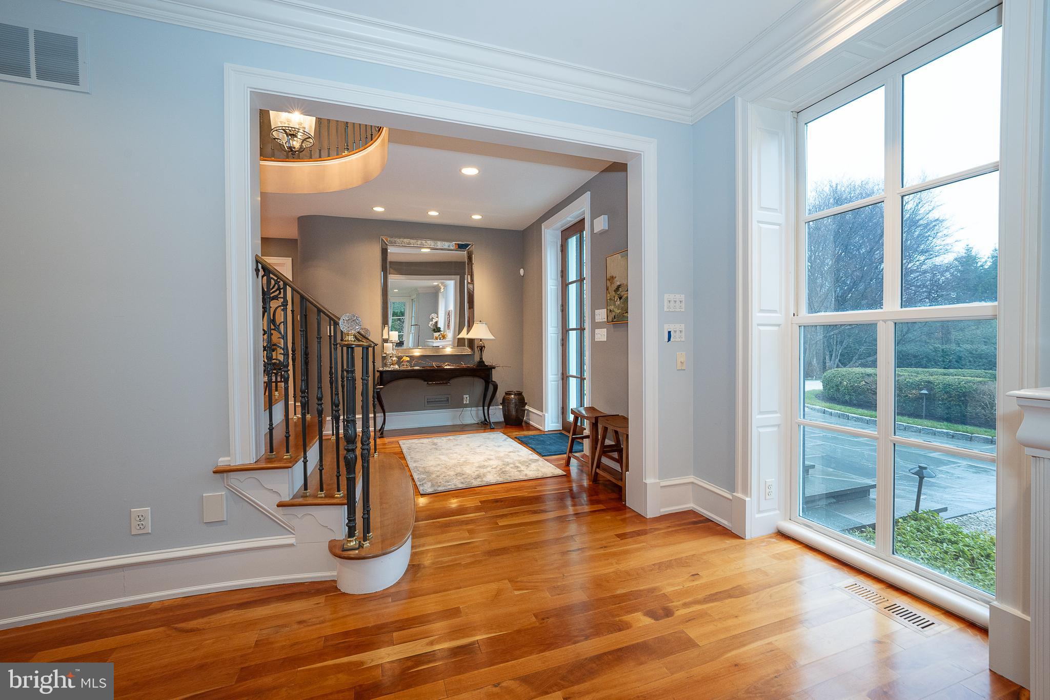 1122 Brynlawn Road Villanova, PA 19085 - Photo 20 of 46 a view of a room with wooden floor and windows