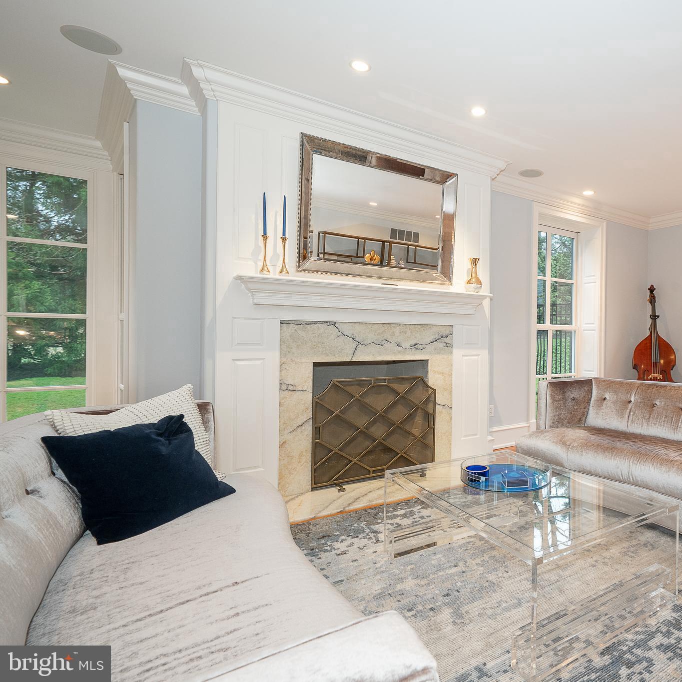 1122 Brynlawn Road Villanova, PA 19085 - Photo 21 of 46 a living room with furniture and a fireplace